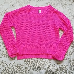 Bright pink cable knit sweater